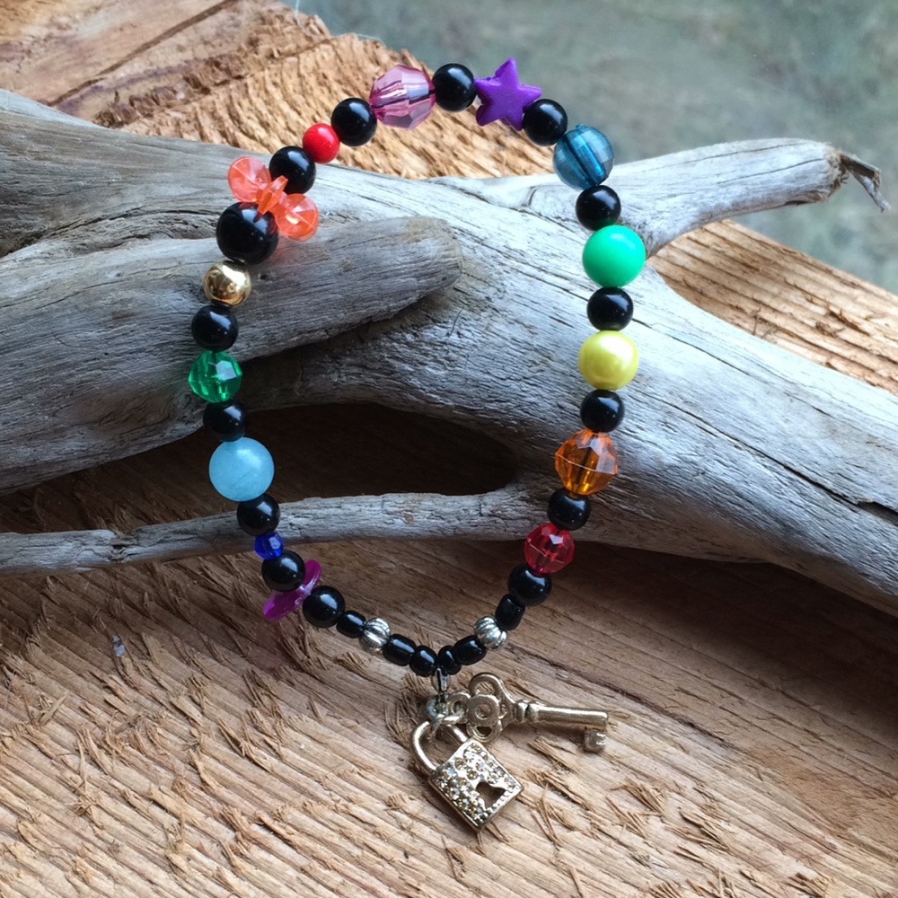Handmade rainbow bead bracelet with lock and key